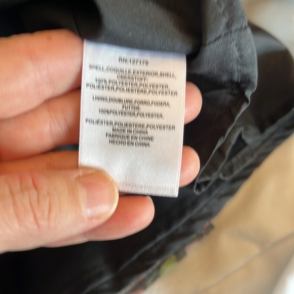 Jenny Yoo Cassie
Flutter Sleeve
Surplice Gown
Black with Floral Pattern. - Picture 11 of 17